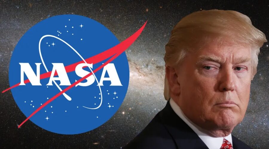 Trump looking annoyed , standing in front of the NASA logo.